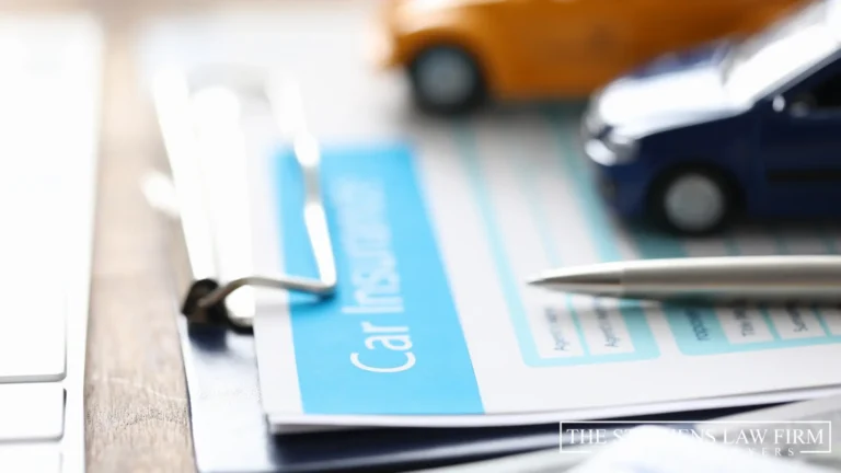 car insurance papers and cars