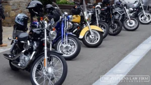 motorcycles parked on side of road